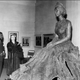 Ben Enwonwu with Queen Elizabeth II and his bronze statue of her.